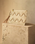 Irma Straw Pouch Wristlet Bag